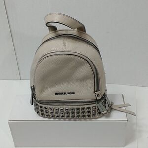 Rhea Medium Studded Pebbled Leather Backpack Missing straps sold as pictured